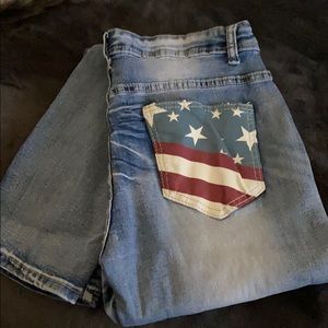 Brand new jeans /American flag. Never worn. Too small but true to sz 8.